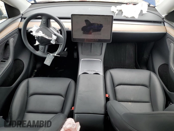 2024 Tesla Model Y Long Range с VIN 7SAYGDEE8RA270862, выставлен на аукционе Copart как лот 58099875 с пробегом 24 856 миль миль и На запчасти • Non repairable. История ставок и продаж доступна на DreamBid. Изображение 8.