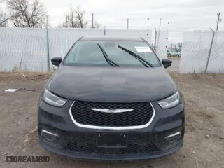 2023 Chrysler Pacifica Hybrid Touring L with VIN 2C4RC1L7XPR518209, listed as a IAAI auction lot 41038104 with 35,969 mi miles. Bid and sale history available at carsss.com. Image 12.