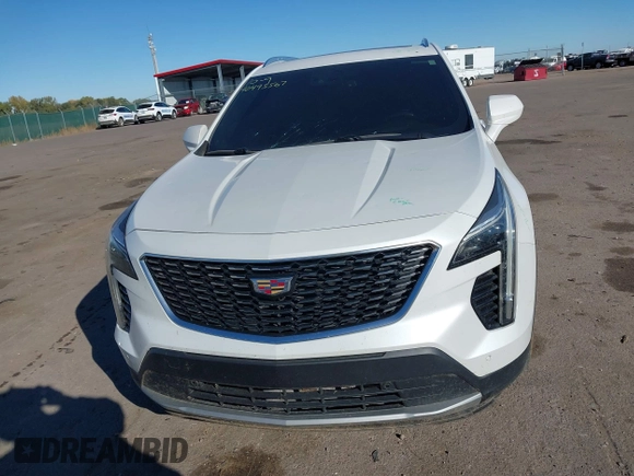 2020 Cadillac XT4 AWD Premium Luxury z VIN 1GYFZDR46LF083118, wystawiony jako IAAI lot #40495567 z przebiegiem 83 224 mil mil oraz . Historia ofert i sprzedaży dostępna na DreamBid. Obrazek 6.