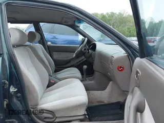 1996 Toyota Camry DX with VIN JT2BG12K5T0346311, listed as a IAAI auction lot 42130482 with 214,872 mi miles. Bid and sale history available at carsss.com. Image 5.