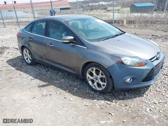 2014 Ford Focus Titanium with VIN 1FADP3J2XEL339925, listed as a IAAI auction lot 41935292 with 120,659 mi miles. Bid and sale history available at carsss.com. Image 1.
