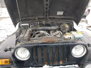2005 Jeep Wrangler X with VIN 1J4FA39S55P353131, listed as a IAAI auction lot 41575949 with 154,026 mi miles and . Bid and sale history available at DreamBid. Image 10.