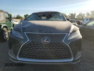 2020 Lexus RX with VIN 2T2AZMAA7LC171195, listed as a Copart auction lot 77195854 with 129,332 mi miles and Clean Title. Bid and sale history available at carsss.com. Image 5.