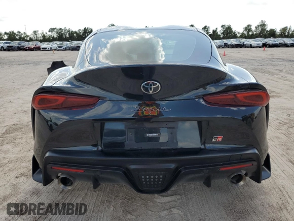 2021 Toyota GR Supra 3.0 with VIN WZ1DB0C00MW042681, listed as a Copart auction lot 59174324 with 7,718 mi miles and Salvage Title. Bid and sale history available at carsss.com. Image 6.