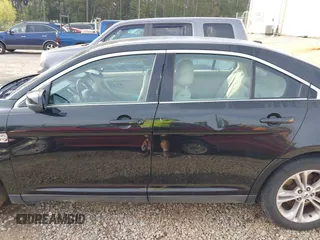 2013 Ford Taurus SEL with VIN 1FAHP2E83DG139440, listed as a IAAI auction lot 41887873 with 251,062 mi miles and . Bid and sale history available at carsss.com. Image 14.