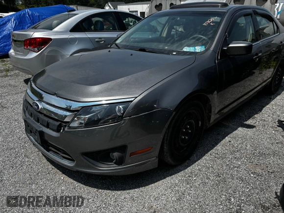 2010 Ford Fusion SE z VIN 3FAHP0HA5AR364515, wystawiony jako Copart lot #61060035 z przebiegiem Nie podano mil oraz Czysty tytuł • Clean title. Historia ofert i sprzedaży dostępna na DreamBid. Obrazek 2.