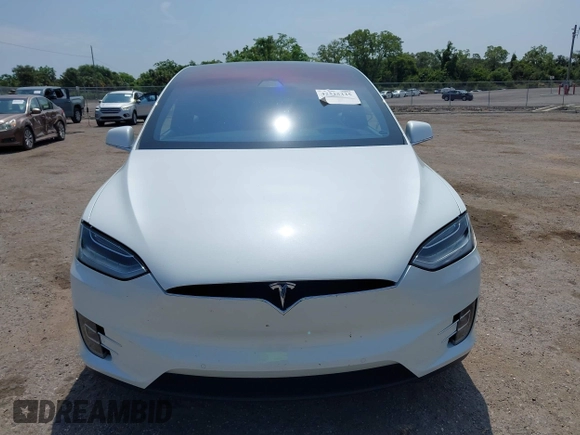 2016 Tesla Model X 70D z VIN 5YJXCBE25GF029372, wystawiony jako IAAI lot #42325335 z przebiegiem 80 071 mil mil oraz . Historia ofert i sprzedaży dostępna na DreamBid. Obrazek 12.