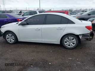 2014 Chevrolet Cruze LS with VIN 1G1PA5SH0E7145168, listed as a IAAI auction lot 41957410 with 151,422 mi miles and . Bid and sale history available at DreamBid. Image 15.