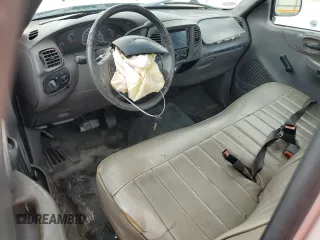 2002 Ford F-150 XL with VIN 1FTRF17W32NB86385, listed as a Copart auction lot 73276754 with 100,817 mi miles and Salvage Title. Bid and sale history available at carsss.com. Image 8.