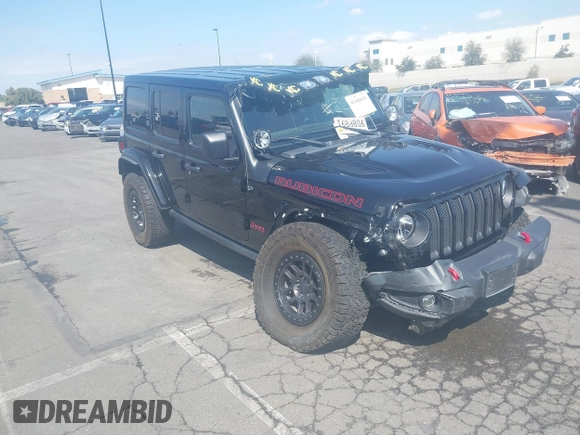 2022 Jeep Wrangler Unlimited Rubicon with VIN 1C4HJXFN0NW242903, listed as a IAAI auction lot 41448636 with 28,007 mi miles and . Bid and sale history available at DreamBid. Image 1.