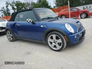 2007 MINI Convertible S with VIN WMWRH33567TJ45123, listed as a Copart auction lot 55702735 with 60,117 mi miles and Salvage title. Bid and sale history available at DreamBid. Image 4.