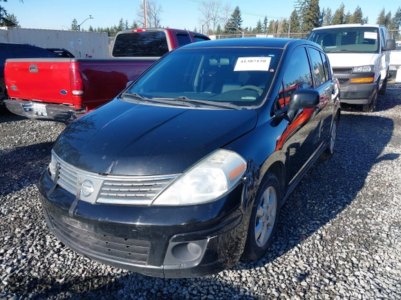 2009 Nissan Versa 1.8 SL with VIN 3N1BC13E59L406937, listed as a IAAI auction lot 41387158 with 149,234 mi miles. Bid and sale history available at carsss.com. Image 17.