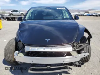 2024 Tesla Model Y Long Range z VIN 7SAYGAEE3RF089122, wystawiony jako Copart lot #52732035 z przebiegiem 15 486 mil mil oraz Szkoda całkowita • Salvage title. Historia ofert i sprzedaży dostępna na DreamBid. Obrazek 5.