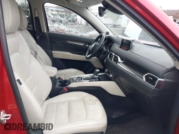2018 Mazda CX-5 Grand Touring with VIN JM3KFBDM0J0427753, listed as a IAAI auction lot 41740838 with 69,683 mi miles and . Bid and sale history available at DreamBid. Image 5.