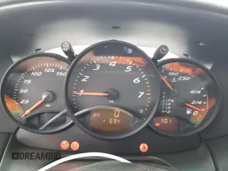 1998 Porsche Boxster с VIN WP0CA2982WU620882, выставлен на аукционе Copart как лот 50950515 с пробегом Не указан миль и Списание • Salvage title. История ставок и продаж доступна на DreamBid. Изображение 9.