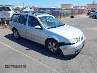 2005 Volkswagen Jetta z VIN WVWSL61JX5W004880, wystawiony jako IAAI lot #41841559 z przebiegiem 107 460 mil mil oraz . Historia ofert i sprzedaży dostępna na DreamBid. Obrazek 1.