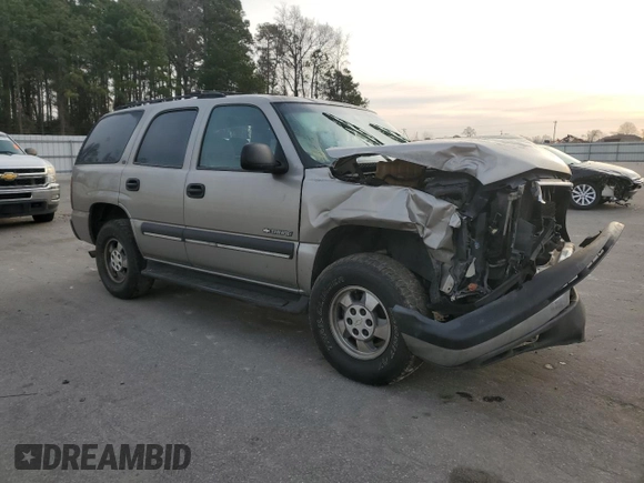 2001 Chevrolet Tahoe LS z VIN 1GNEC13T81J212124, wystawiony jako Copart lot #49049865 z przebiegiem 245 904 mil mil oraz Szkoda całkowita • Salvage title. Historia ofert i sprzedaży dostępna na DreamBid. Obrazek 4.