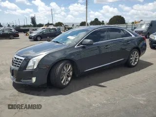 2013 Cadillac XTS Luxury with VIN 2G61R5S34D9101006, listed as a Copart auction lot 51241485 with 143,522 mi miles and Clean Title. Bid and sale history available at carsss.com. Image 1.
