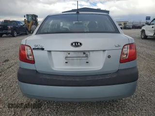 2009 Kia Rio LX with VIN KNADE223496469797, listed as a Copart auction lot 71005774 with 130,675 mi miles and Salvage Title. Bid and sale history available at carsss.com. Image 6.