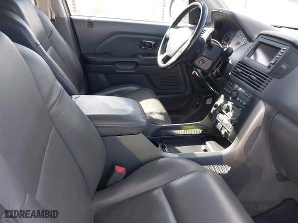 2005 Honda Pilot EX-L with NAVI with VIN 2HKYF18785H565681, listed as a IAAI auction lot 41739543 with 115,549 mi miles. Bid and sale history available at carsss.com. Image 5.