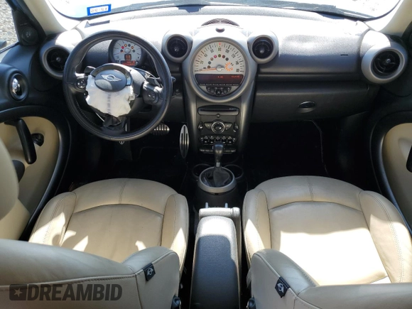 2011 MINI Countryman S with VIN WMWZC5C54BWL53955, listed as a Copart auction lot 52187405 with 124,470 mi miles and Salvage Title. Bid and sale history available at DreamBid. Image 8.