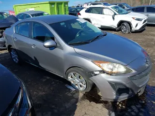 2011 Mazda Mazda3 i Touring with VIN JM1BL1VF1B1385892, listed as a IAAI auction lot 40926162 with 135,640 mi miles. Bid and sale history available at carsss.com. Image 1.