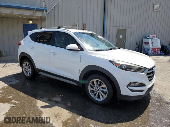 2017 Hyundai Tucson SE with VIN KM8J33A41HU506970, listed as a Copart auction lot 52351705 with 86,074 mi miles and Salvage Title. Bid and sale history available at DreamBid. Image 4.