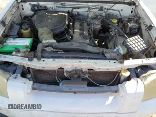 2003 Nissan Frontier XE with VIN 1N6DD26T63C467751, listed as a Copart auction lot 41842545 with 397,556 mi miles and Salvage title. Bid and sale history available at DreamBid. Image 11.