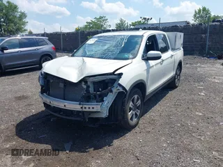 2019 Honda Ridgeline RTL-E with VIN 5FPYK3F71KB017906, listed as a IAAI auction lot 42670476 with 58,288 mi miles and . Bid and sale history available at DreamBid. Image 2.