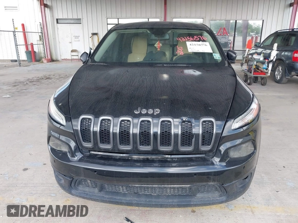 2015 Jeep Cherokee Sport with VIN 1C4PJLAB2FW539397, listed as a IAAI auction lot 42156576 with 120,409 mi miles. Bid and sale history available at carsss.com. Image 6.