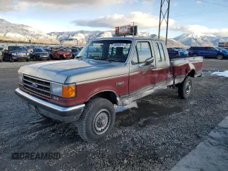 1990 Ford F-250 with VIN 1FTHX26H9LKA97005, listed as a Copart auction lot 86840874 with 111,275 mi miles and Salvage Title. Bid and sale history available at carsss.com. Image 1.