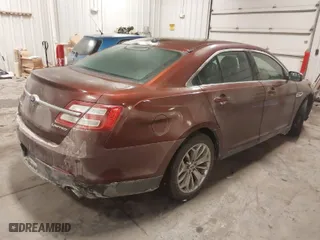 2015 Ford Taurus Limited with VIN 1FAHP2F82FG102557, listed as a IAAI auction lot 41618362 with 110,000 mi miles. Bid and sale history available at carsss.com. Image 4.