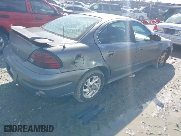 2004 Pontiac Grand Am SE1 z VIN 1G2NF52F04M513755, wystawiony jako IAAI lot #41600613 z przebiegiem Nie podano mil oraz . Historia ofert i sprzedaży dostępna na DreamBid. Obrazek 4.