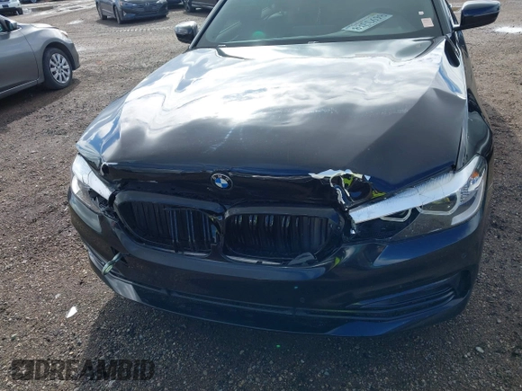 2018 BMW 5 Series 530i z VIN WBAJA5C54JWA38285, wystawiony jako IAAI lot #41390399 z przebiegiem 74 840 mil mil oraz . Historia ofert i sprzedaży dostępna na DreamBid. Obrazek 6.