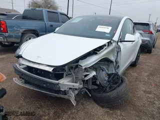 2022 Tesla Model Y Long Range with VIN 7SAYGDEE2NA011388, listed as a IAAI auction lot 41423536 with 44,783 mi miles. Bid and sale history available at carsss.com. Image 23.