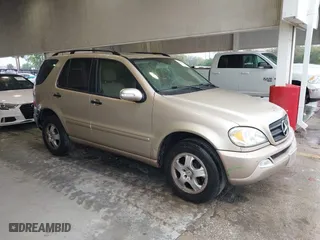 2005 Mercedes-Benz M-Class 3.7L with VIN 4JGAB57E05A553208, listed as a IAAI auction lot 41622243 with 90,904 mi miles. Bid and sale history available at carsss.com. Image 1.