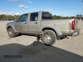 2003 Nissan Frontier XE with VIN 1N6ED27T83C435077, listed as a Copart auction lot 85463504 with 250,811 mi miles and Clean title. Bid and sale history available at DreamBid. Image 2.