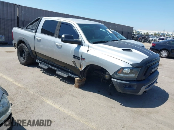 2016 Ram 1500 Rebel z VIN 1C6RR7YT5GS251994, wystawiony jako IAAI lot #42139378 z przebiegiem 102 736 mil mil oraz . Historia ofert i sprzedaży dostępna na DreamBid. Obrazek 1.