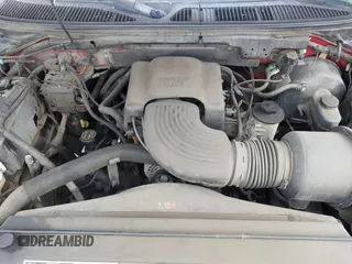 2002 Ford F-150 XL z VIN 1FTRX18W92KE21921, wystawiony jako IAAI lot #42488433 z przebiegiem 151 746 mil mil oraz . Historia ofert i sprzedaży dostępna na DreamBid. Obrazek 10.