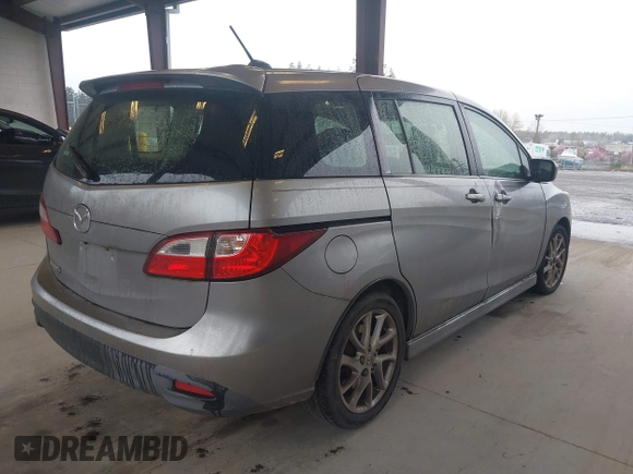 2012 Mazda Mazda5 Grand Touring with VIN JM1CW2DL7C0143303, listed as a IAAI auction lot 41924227 with 126,689 mi miles. Bid and sale history available at carsss.com. Image 4.