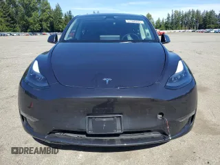 2024 Tesla Model Y Long Range with VIN 7SAYGDEE9RF120729, listed as a Copart auction lot 57360265 with 21,589 mi miles and Salvage title. Bid and sale history available at DreamBid. Image 5.