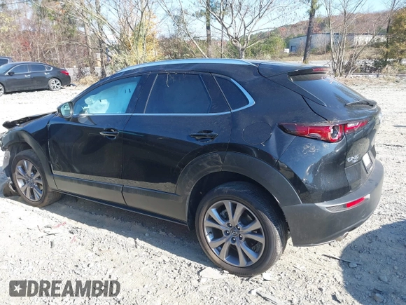 2023 Mazda CX-30 2.5 S Premium Package with VIN 3MVDMBDMXPM529797, listed as a IAAI auction lot 41012225 with 26,354 mi miles. Bid and sale history available at carsss.com. Image 15.