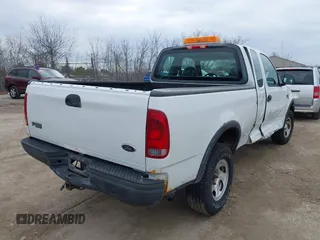 2003 Ford F-150 XL with VIN 2FTRX18W03CB12800, listed as a IAAI auction lot 41897027 with 1 mi miles. Bid and sale history available at carsss.com. Image 4.