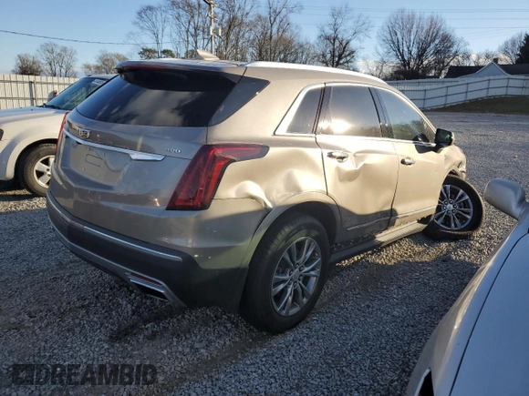 2023 Cadillac XT5 FWD Premium Luxury with VIN 1GYKNCRS6PZ108977, listed as a Copart auction lot 87249294 with 0 mi miles and Salvage Title. Bid and sale history available at carsss.com. Image 3.