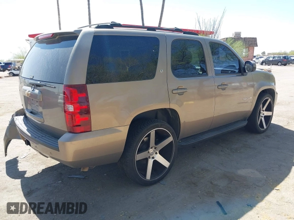 2007 Chevrolet Tahoe LT z VIN 1GNFC13077R226276, wystawiony jako IAAI lot #42232796 z przebiegiem 169 595 mil mil oraz . Historia ofert i sprzedaży dostępna na DreamBid. Obrazek 4.