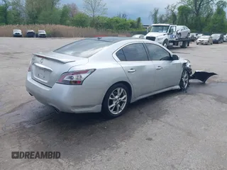 2014 Nissan Maxima S with VIN 1N4AA5AP3EC498006, listed as a IAAI auction lot 42114320 with 162,451 mi miles and . Bid and sale history available at DreamBid. Image 4.