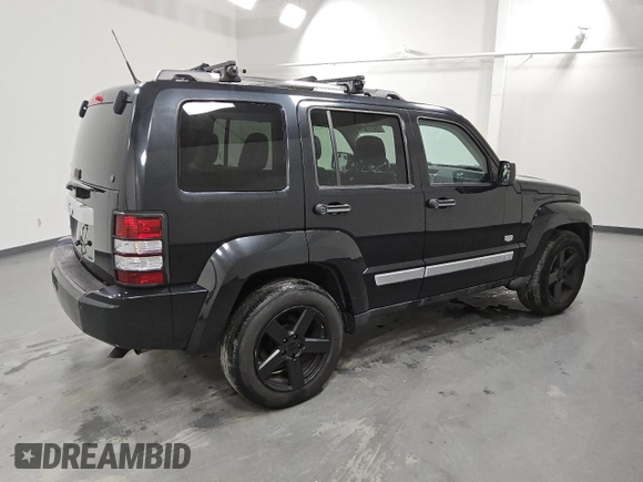 2011 Jeep Liberty Sport 70th Anniversary with VIN 1J4PN2GK5BW558133, listed as a Copart auction lot 52900925 with 119,803 mi miles and Clean Title. Bid and sale history available at DreamBid. Image 3.