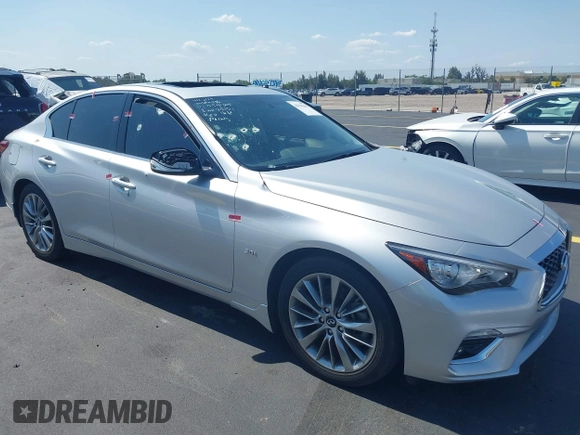 2019 Infiniti Q50 Luxe z VIN JN1EV7AP3KM510305, wystawiony jako IAAI lot #42225255 z przebiegiem 33 902 mil mil oraz . Historia ofert i sprzedaży dostępna na DreamBid. Obrazek 1.
