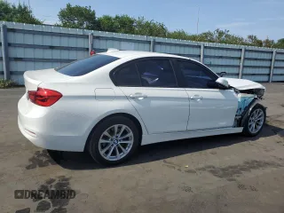 2018 BMW 3 Series 320i xDrive with VIN WBA8A3C55JA357532, listed as a Copart auction lot 57561015 with 46,876 mi miles and Salvage title. Bid and sale history available at DreamBid. Image 3.
