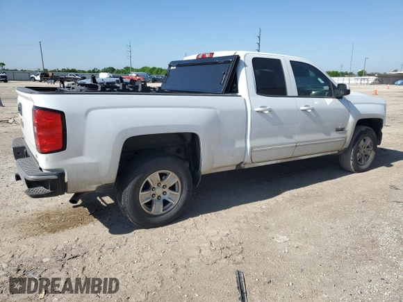 2018 Chevrolet Silverado 1500 LT with VIN 1GCRCREC2JZ217553, listed as a Copart auction lot 51945385 with 117,514 mi miles and Salvage Title. Bid and sale history available at DreamBid. Image 3.